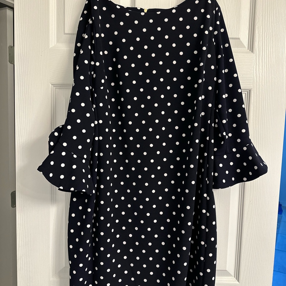 Elegant Black Polka Dot Dress with Ruffled Sleeves